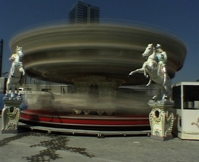 Stroboscopic image of a revolving fairground carousel