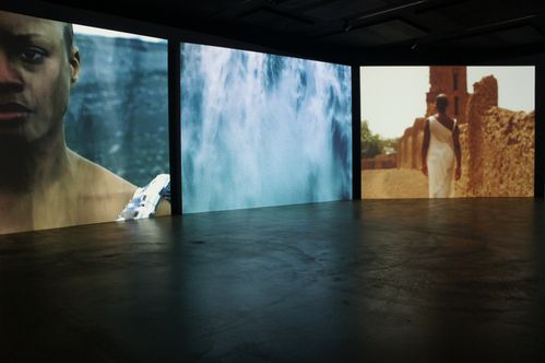 Installation view of a 3-channel video projection