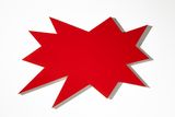Ein roter Stern mit zehn unregelmäßigen Spitzen. Das Objekt hat etwas comichaftes.