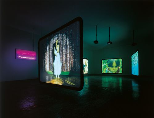 Exhibition view with four video projections
