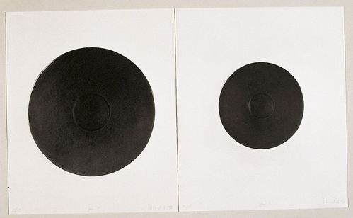 Two-part work consisting of heliogravures, each showing a larger and a smaller black circular shape resembling a hotplate in the center.