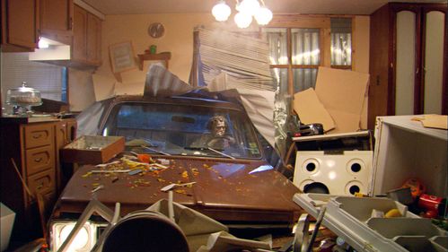 A woman drove her car through the wall into an apartment